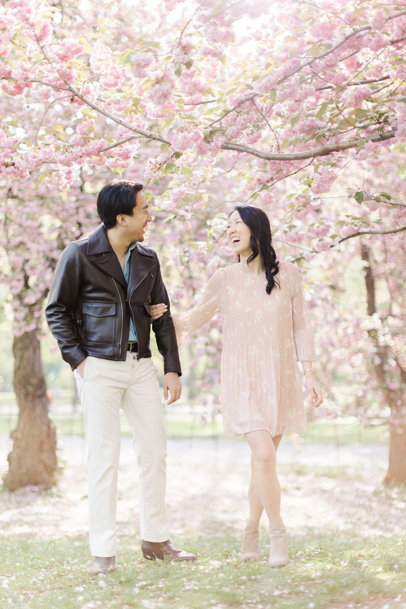 Joyful Engagement Photos With Cherry Blossoms in NYC