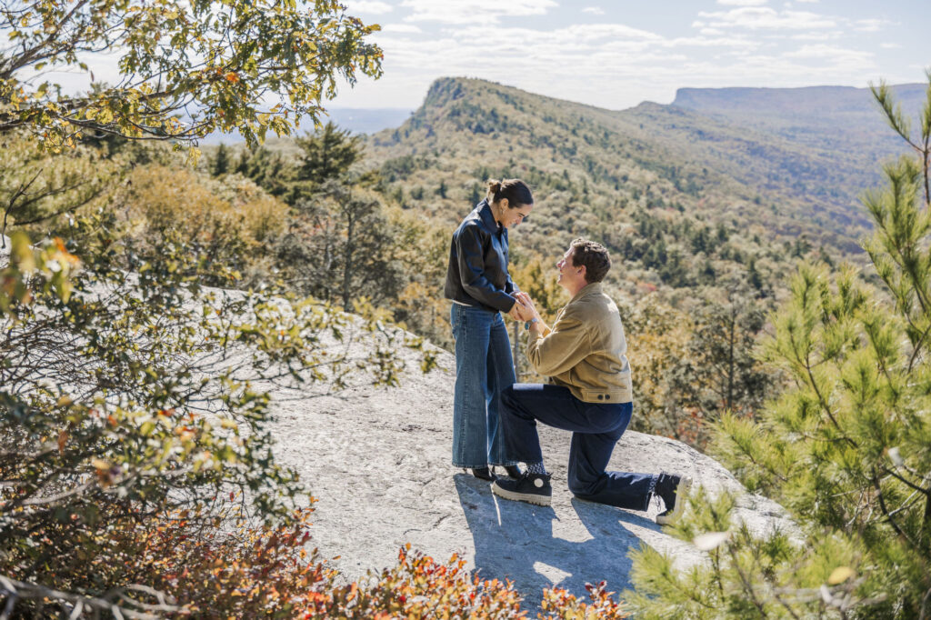 Candid Hudson Valley proposal photos with true to life color and real excitement at Mohonk Mountain House