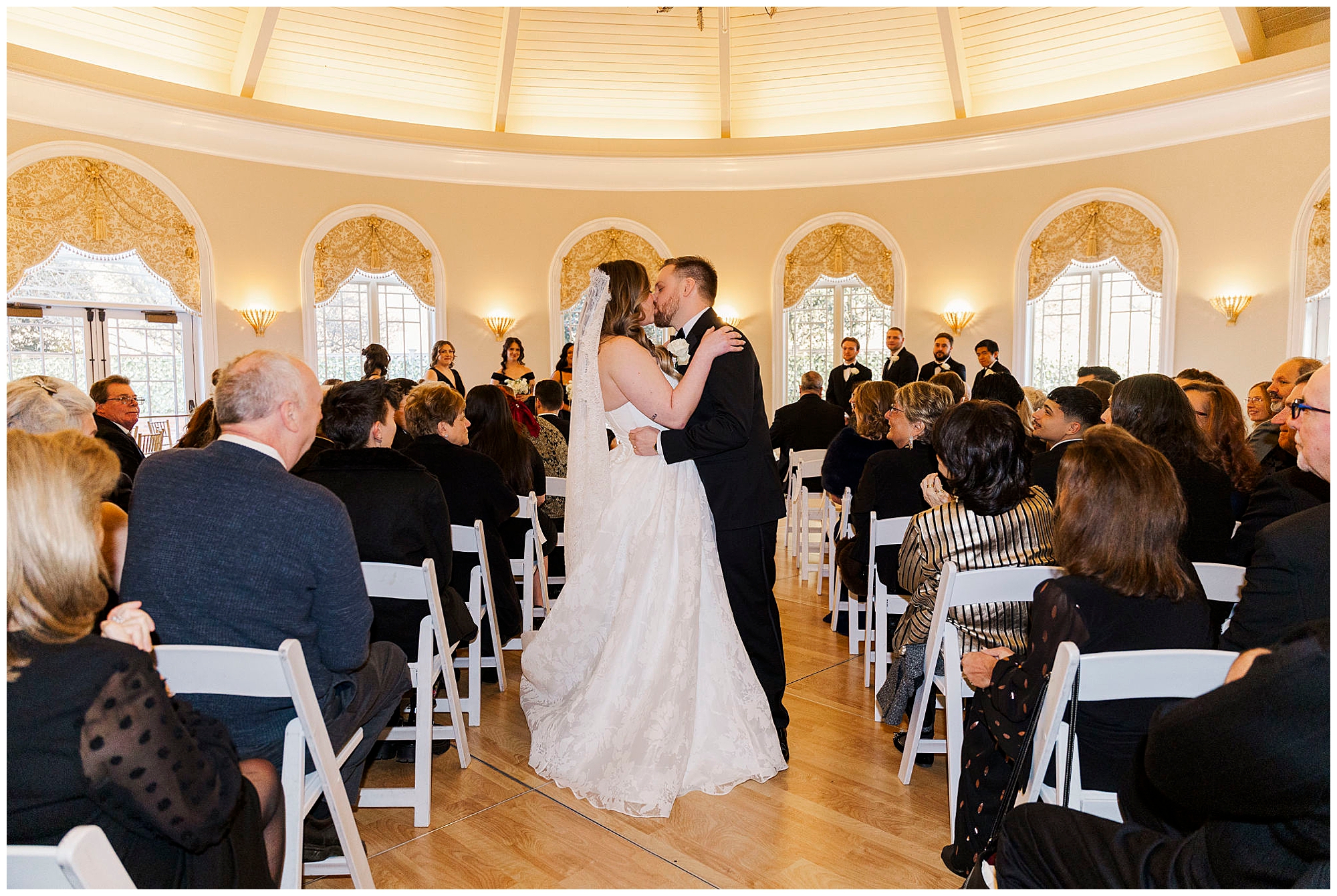 Couple holding hands during winter ceremony in Connecticut