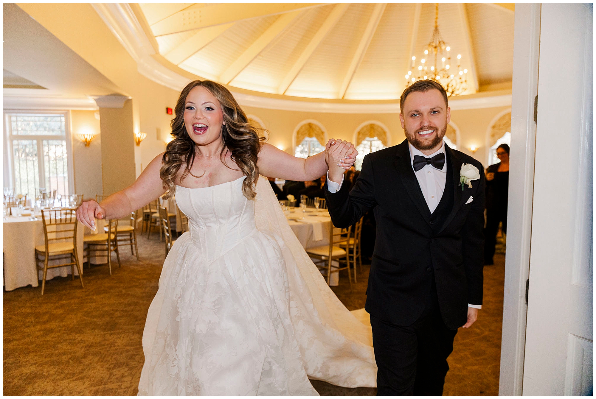 Guests applauding during winter wedding reception in Milford, CT