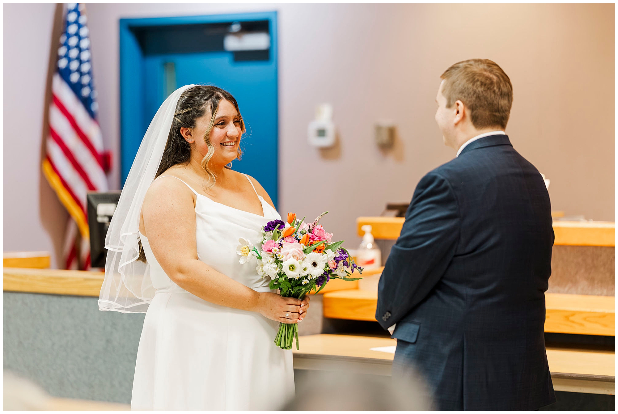 Bridal detail shot with courthouse ceremony backdrop in Hudson Valley