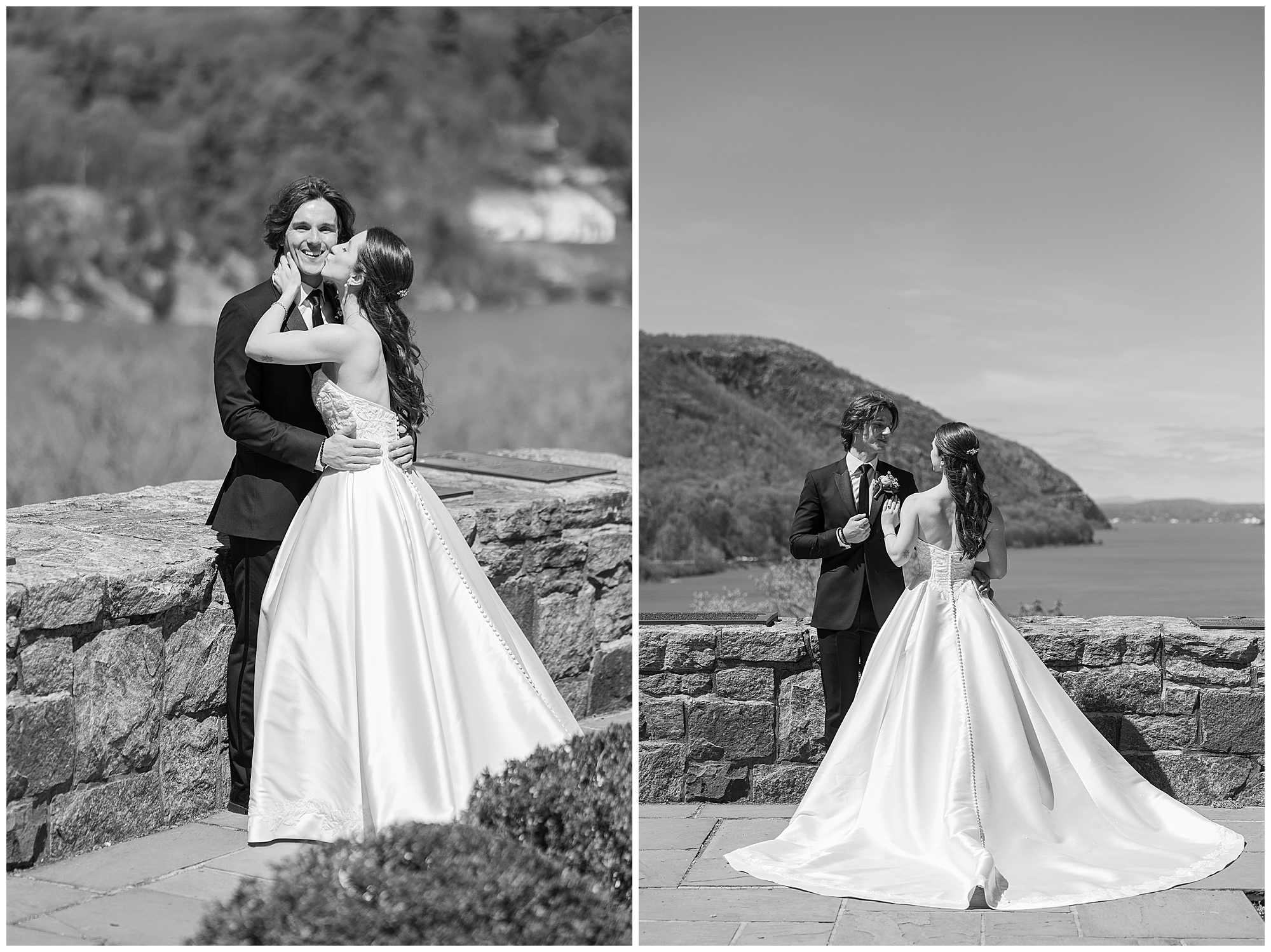 Black and white photo of couple at a stone overlook with the Hudson River behind them at West Point