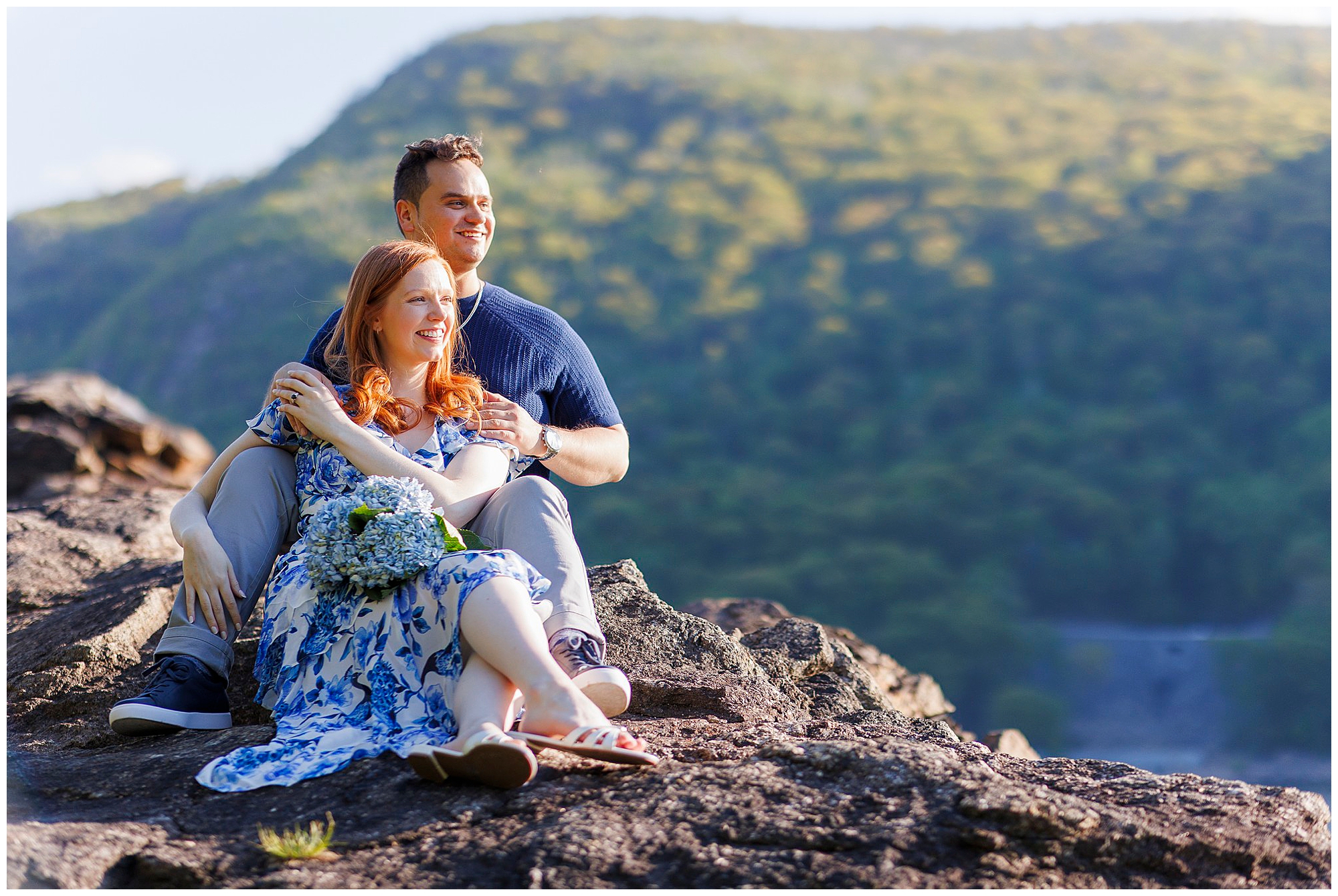 Couple on mountain overlook Hudson Valley wedding photography scenic engagement portrait