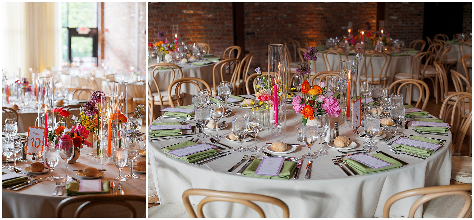 Elegant wedding reception tables with white linens, green napkins, bread rolls, glassware, and colorful floral centerpieces in tall vases. Wooden chairs surround the tables in a softly lit, brick-walled roundhouse wedding venue.