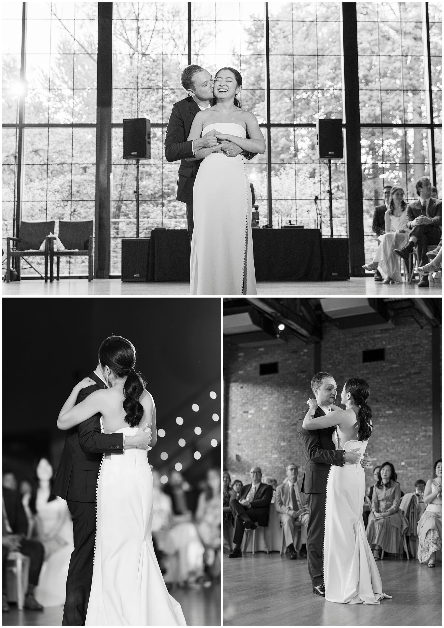 A bride and groom share a joyful first dance at their roundhouse wedding reception. The couple embraces on the dance floor, surrounded by seated guests, in a bright venue with large windows and exposed brick walls.