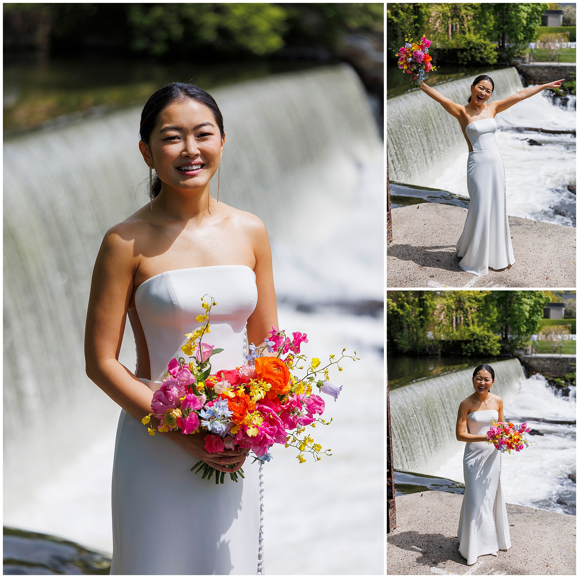 A woman in a strapless white dress holds a vibrant bouquet of flowers, smiling and posing cheerfully with outstretched arms in front of a waterfall at her roundhouse wedding.
