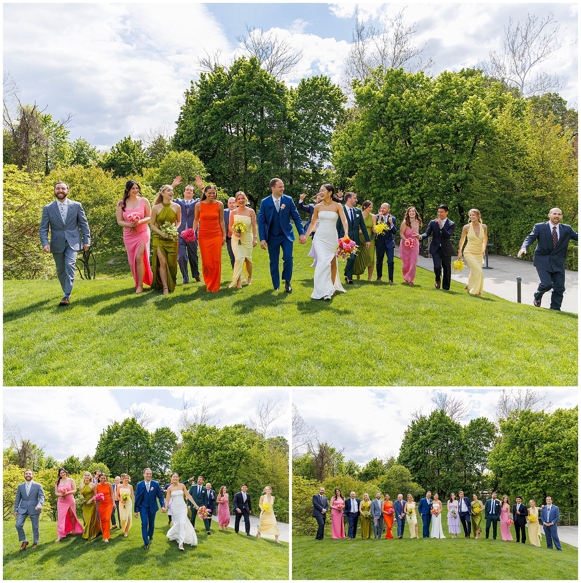 A wedding party walks together on a green lawn at a roundhouse wedding, dressed in colorful formal attire. The group includes the bride in white, groom in blue, bridesmaids in bright dresses, and groomsmen in suits under a partly cloudy sky.