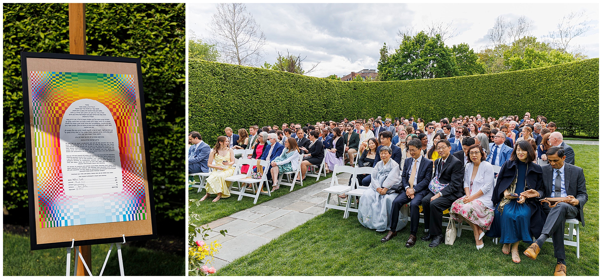 A colorful, framed wedding program is displayed on an easel at a roundhouse wedding, next to a large outdoor gathering of formally dressed guests seated on white chairs amid tall, manicured hedges under a cloudy sky.