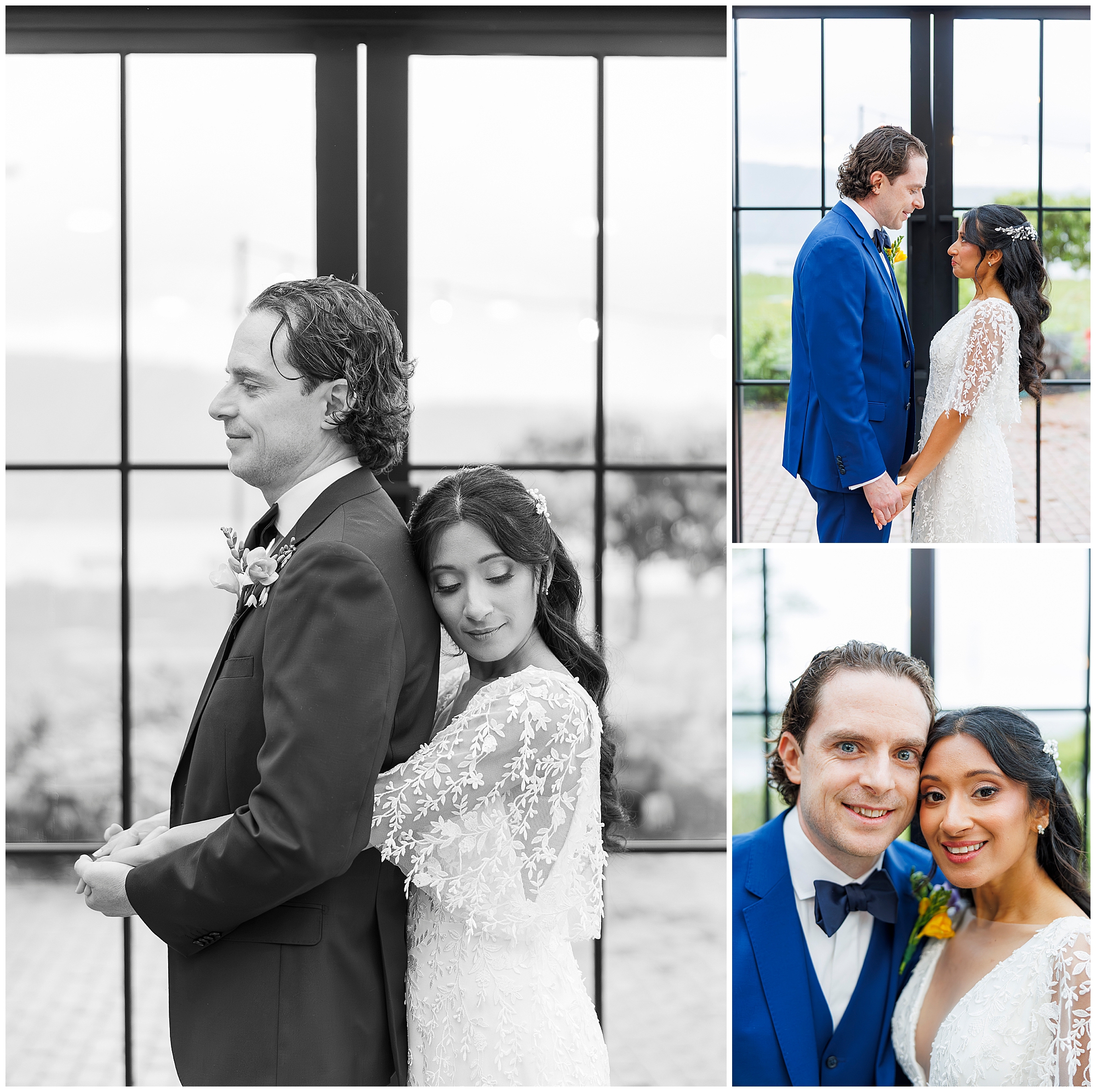 A bride in a lace dress and a groom in a blue suit embrace and smile in front of large windows during their Harvest on Hudson micro wedding.