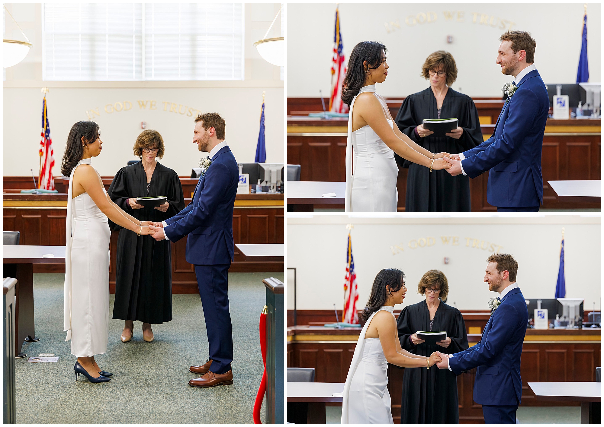 A bride and groom hold hands and face each other during their Beacon City Hall elopement, officiated by a judge with American flags and the phrase In God We Trust visible in the background.