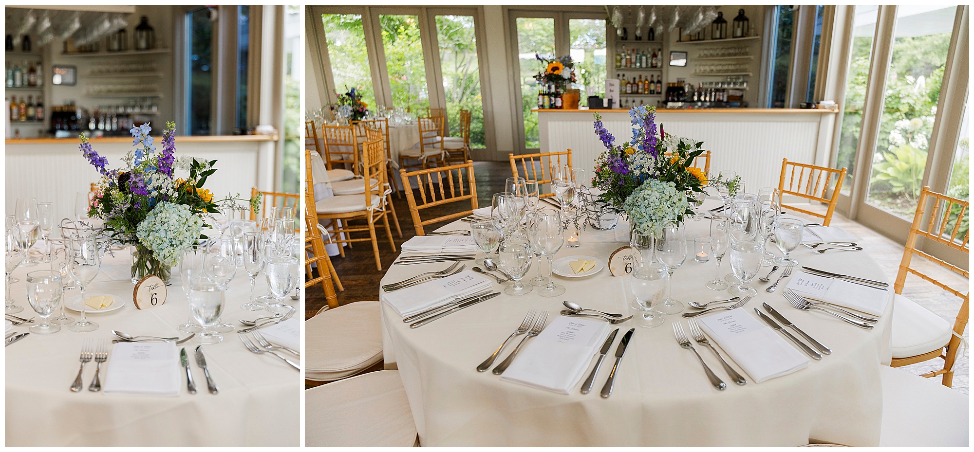 Elegant summer garrison wedding reception setup with round tables covered in white tablecloths, floral centerpieces, glassware, silverware, menus, and wooden chairs in a bright room with large windows.