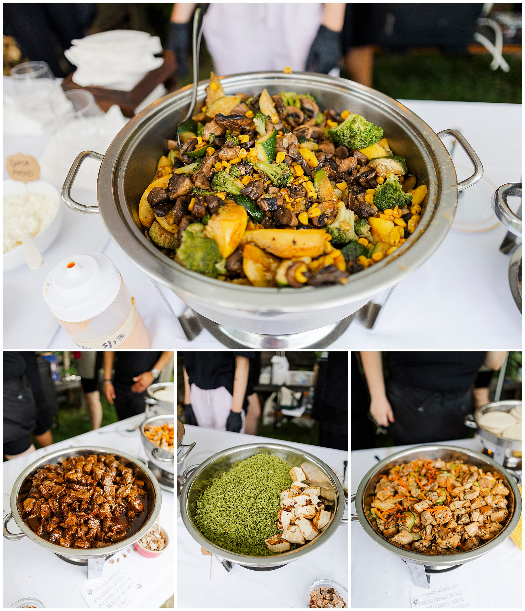 A buffet table at a wedding at the yard features four dishes: a large tray of mixed vegetables and mushrooms, trays of cooked meat chunks, green rice, and diced chicken with vegetables, all beautifully arranged for serving.