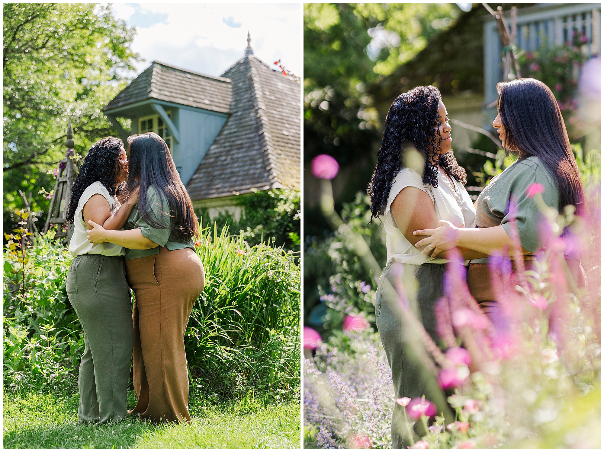 Two women stand close together in a garden, holding hands and gazing at each other lovingly. The lush greenery and colorful flowers of Stonecrop Gardens surround them on a sunny day, capturing beautiful LGBTQ engagement photos.