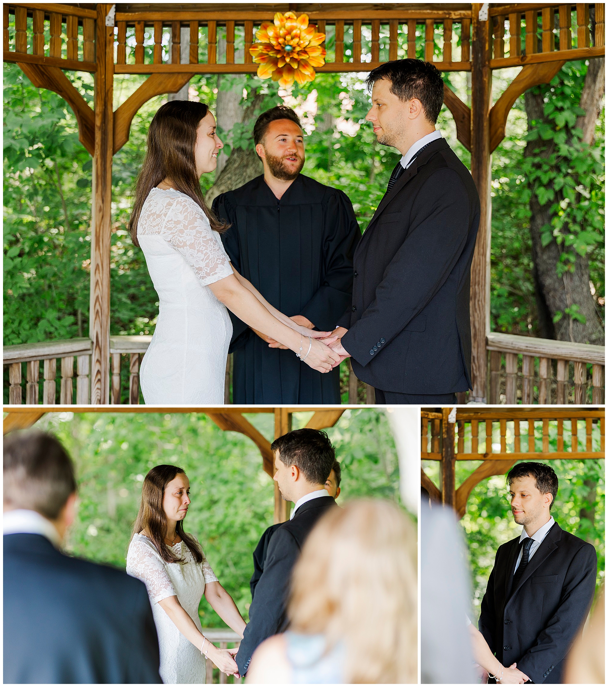A couple stands facing each other holding hands in a gazebo during their Wappingers Falls Town Hall elopement ceremony, with an officiant between them. The setting is outdoors, framed by green trees in the background.