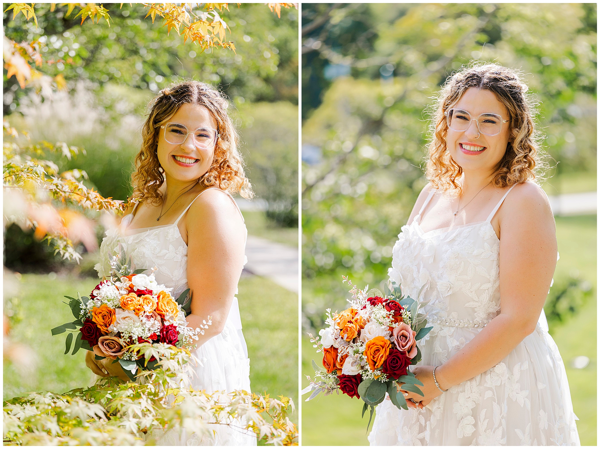 Smiling bride with curly hair and glasses holds her colorful bouquet among sunlit greenery.