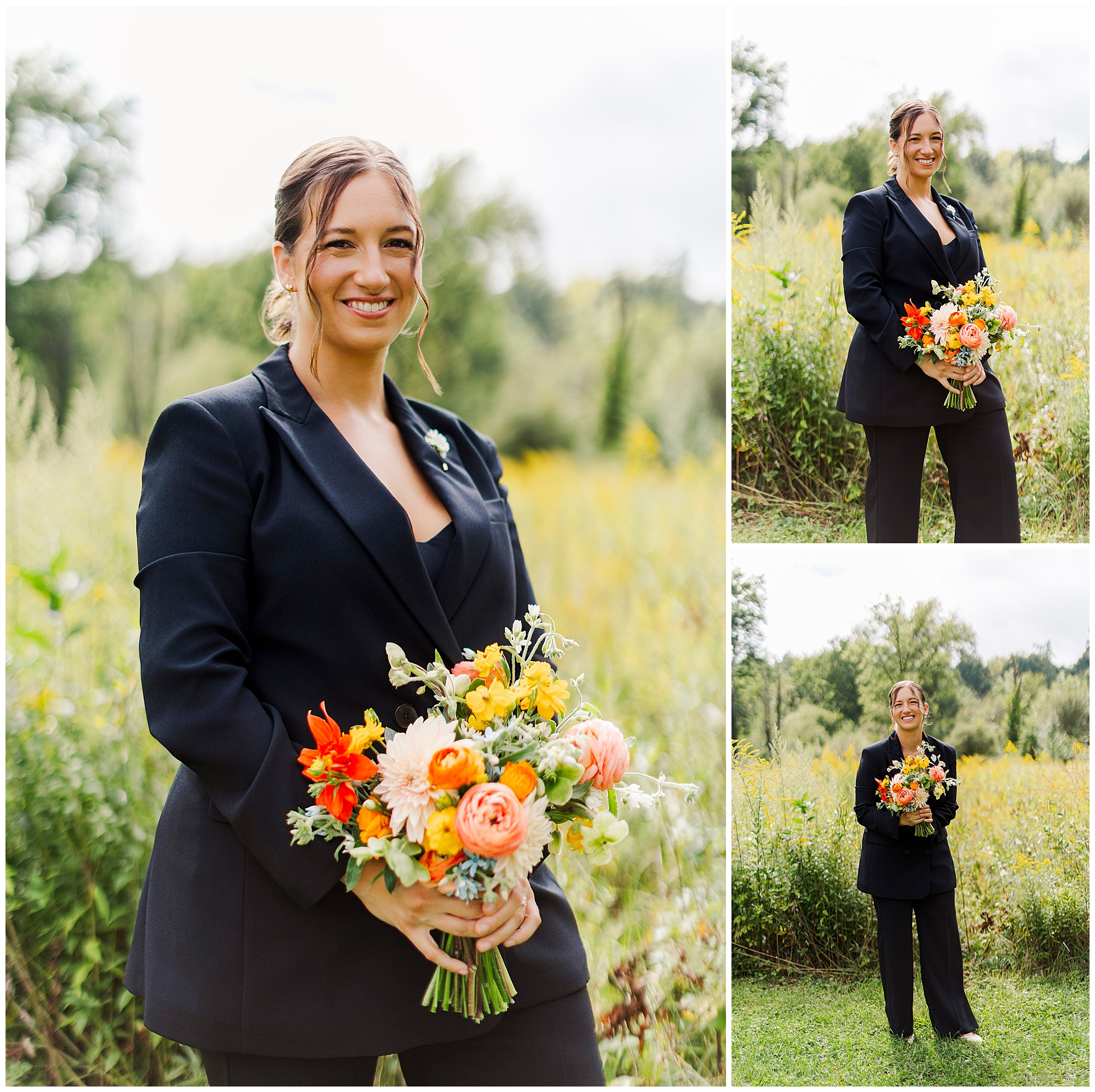 A person in a black suit holds a colorful bouquet of flowers, standing outdoors in a green, grassy field with tall plants and trees in the background.