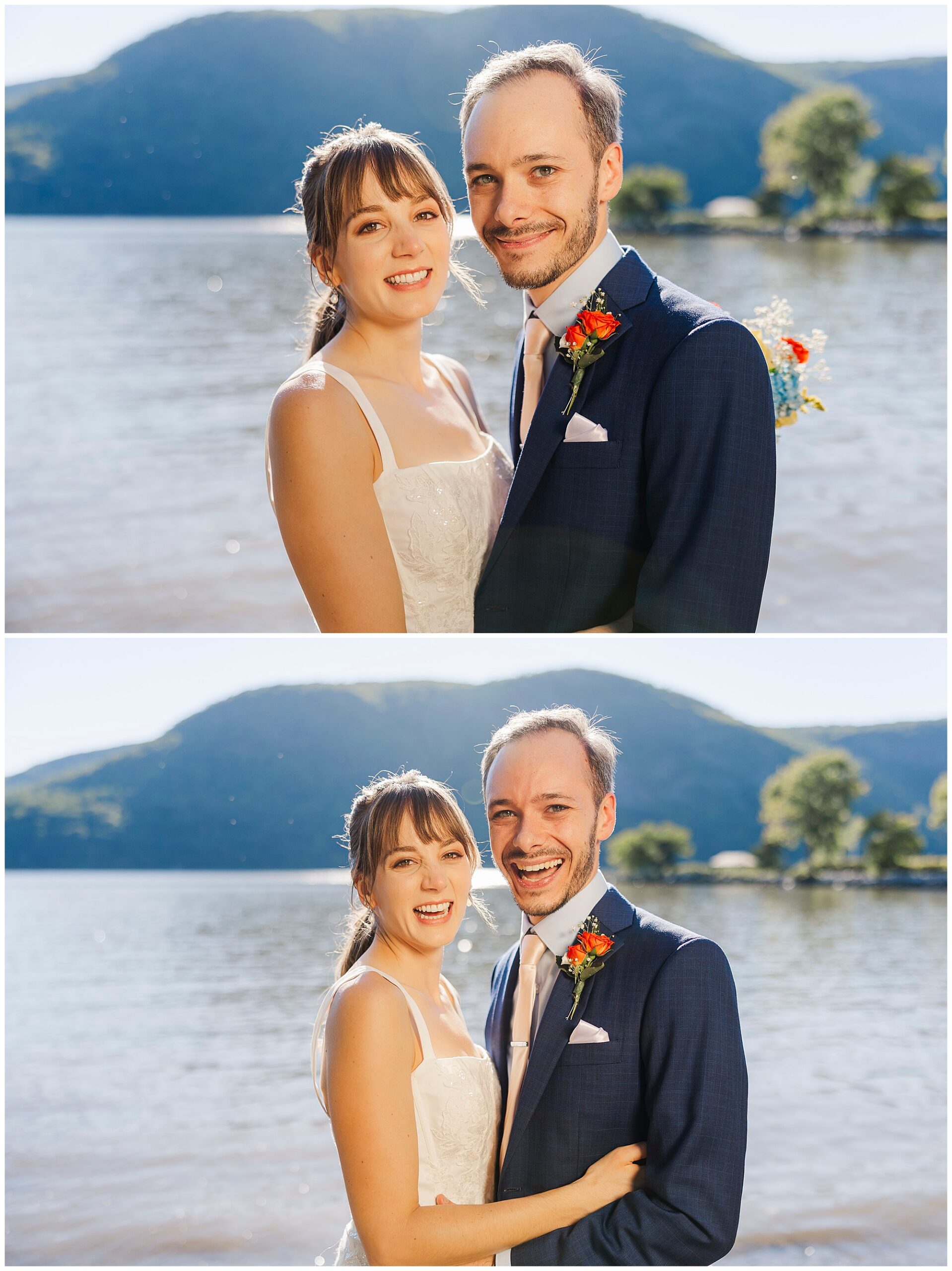 Newlyweds stand close together, smiling by the river with mountains and trees behind them in natural sunlight.