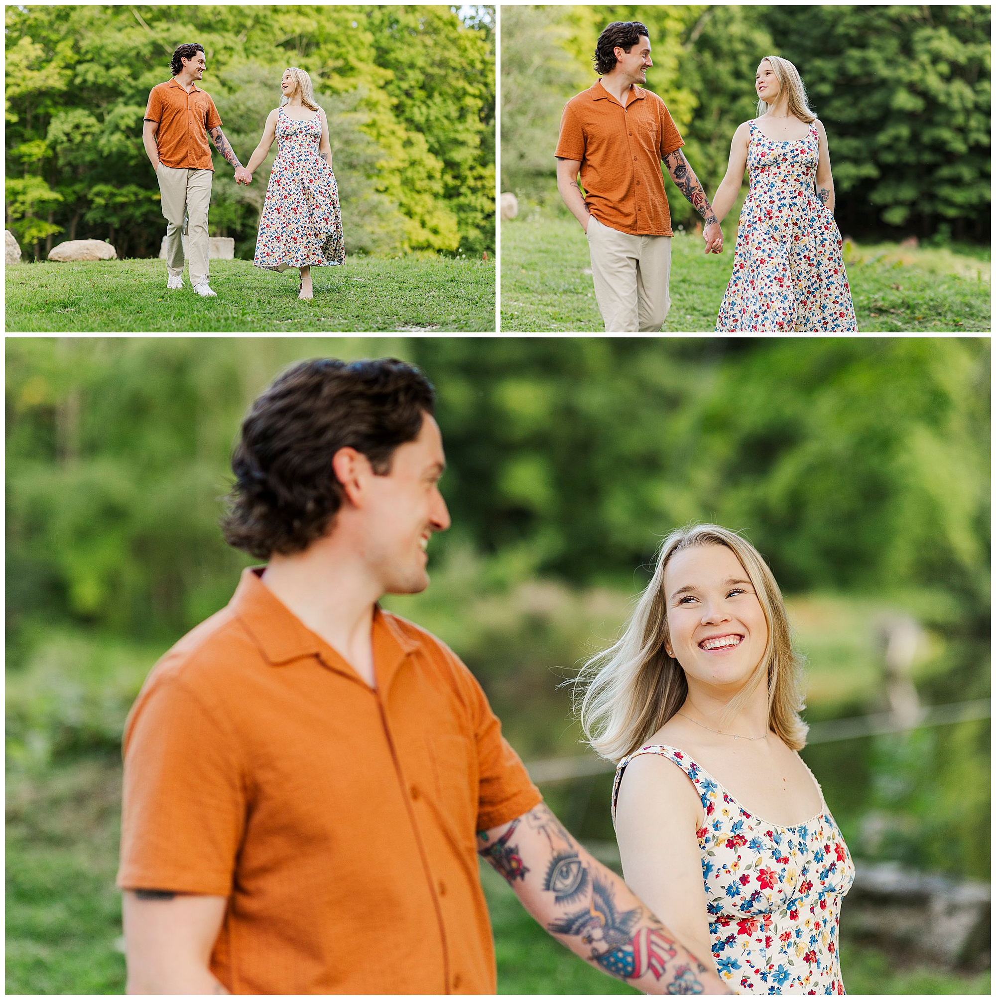 Couple walks hand in hand through the park smiling, surrounded by green trees and grass.