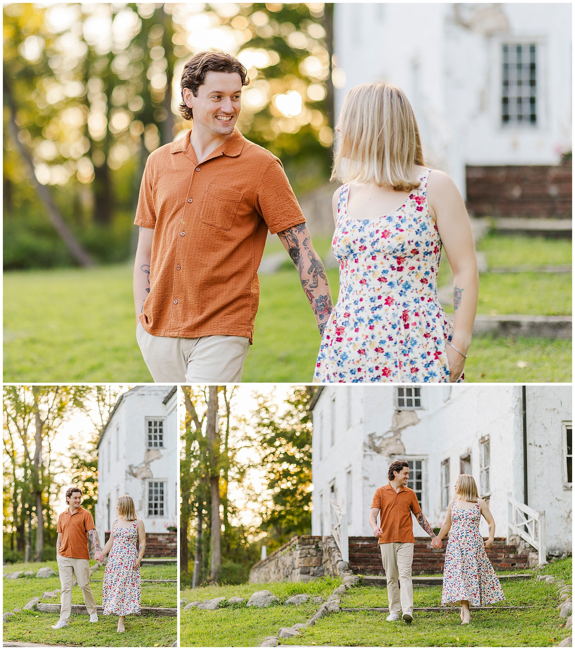 Couple smiles at each other and walks hand in hand outside a rustic white house on a sunny day.