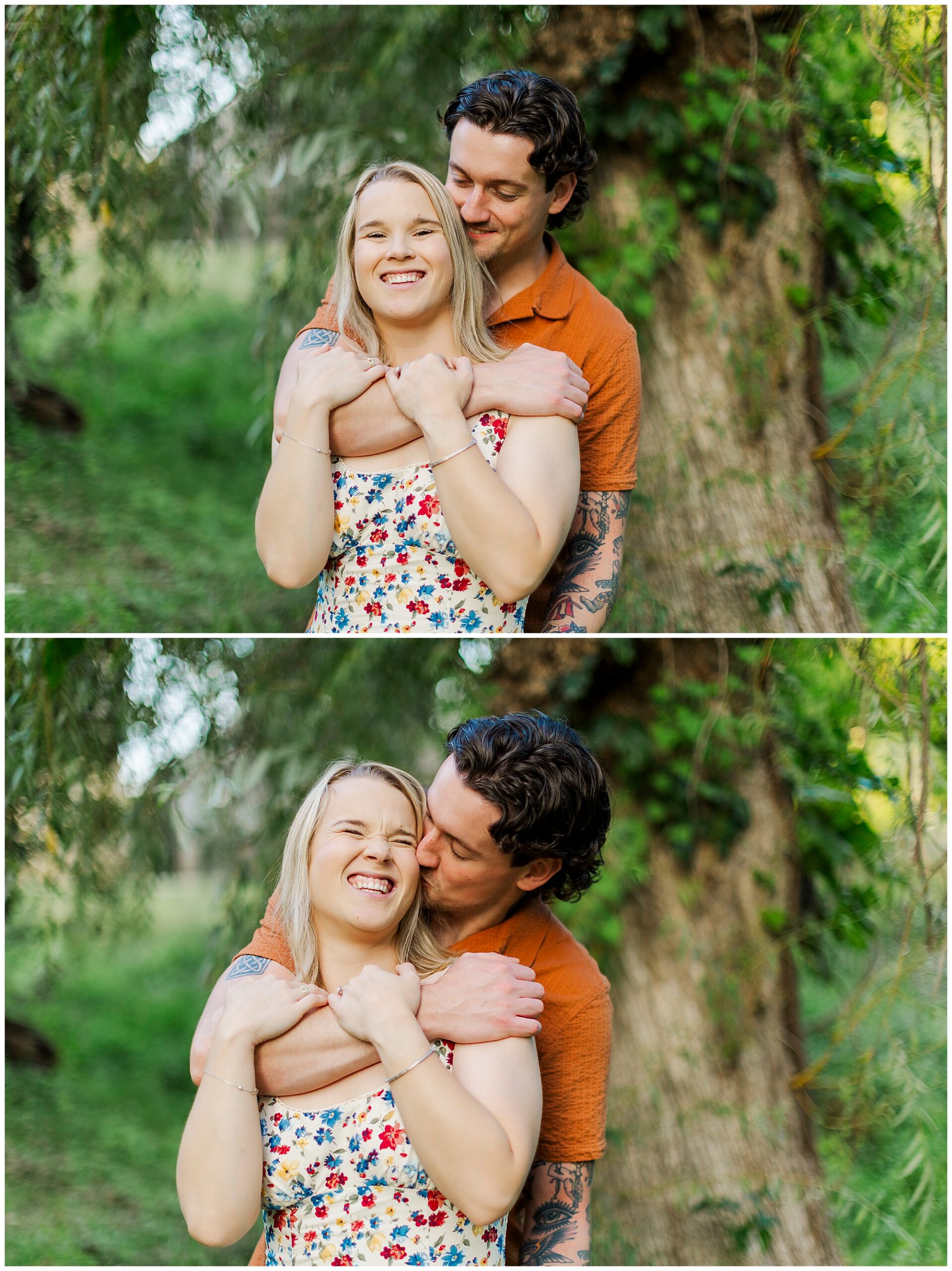 He hugs her from behind in front of a tree as they both smile and laugh.