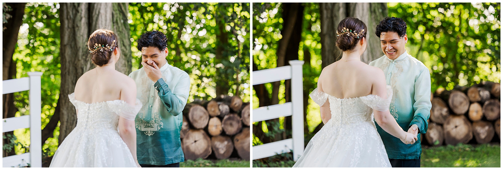 Emotional, smiling groom sees his bride in her wedding dress during their first look among trees and stacked logs.
