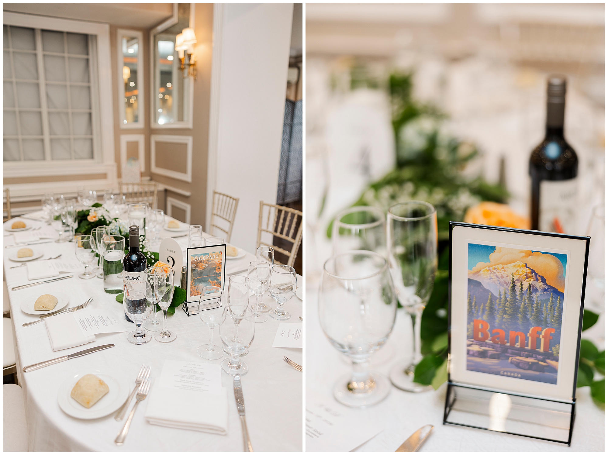 Elegant wedding table setting with wine, menus, bread rolls, and glassware. Centerpieces include greenery and a framed Banff art print. Soft lighting and neutral decor create a warm, inviting atmosphere.