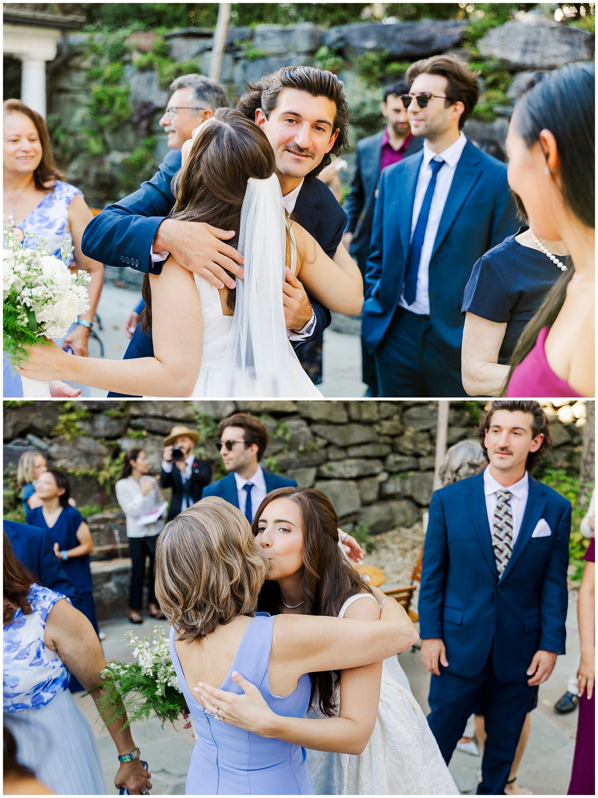 Bride hugs a man in a blue suit and kisses a woman in a light purple dress while greeting guests outdoors.