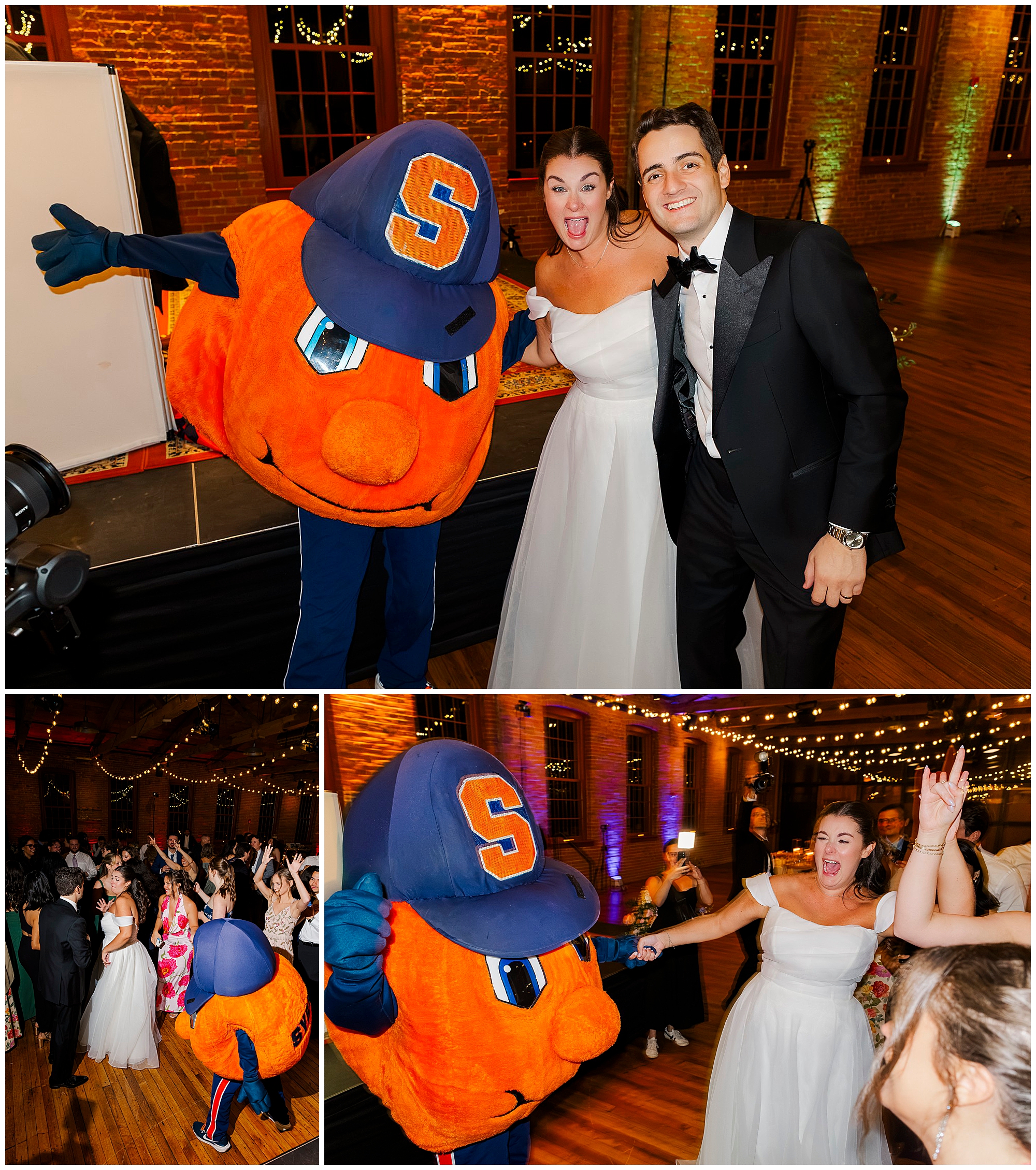 A bride and groom joyfully pose with the Syracuse University mascot, Otto the Orange, at their wedding reception. Guests dance and celebrate under string lights in a warmly lit venue.